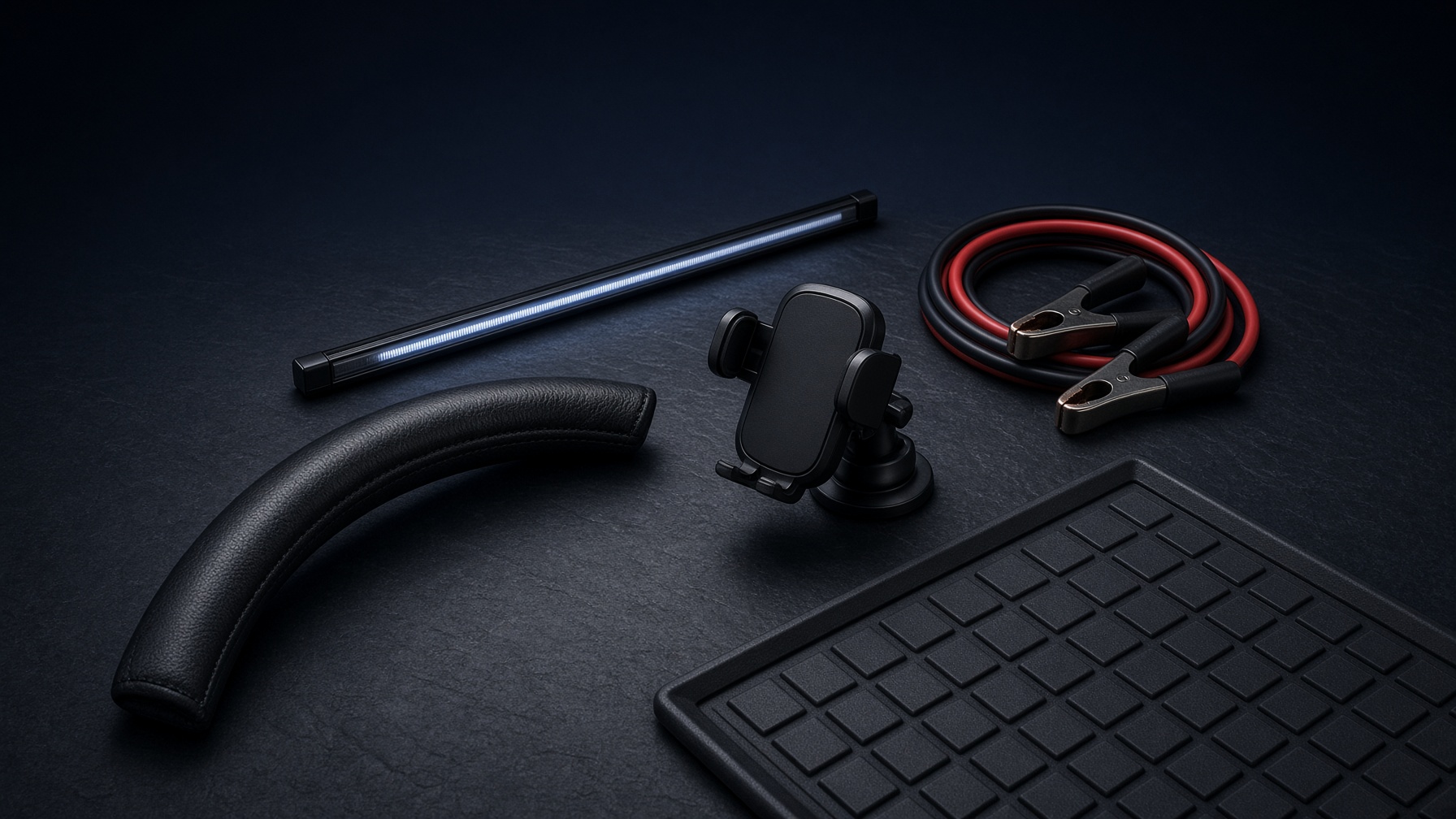 Editorial still life of premium car accessories on dark slate